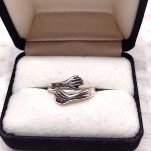 Sterling Silver Hugging Hands Ring